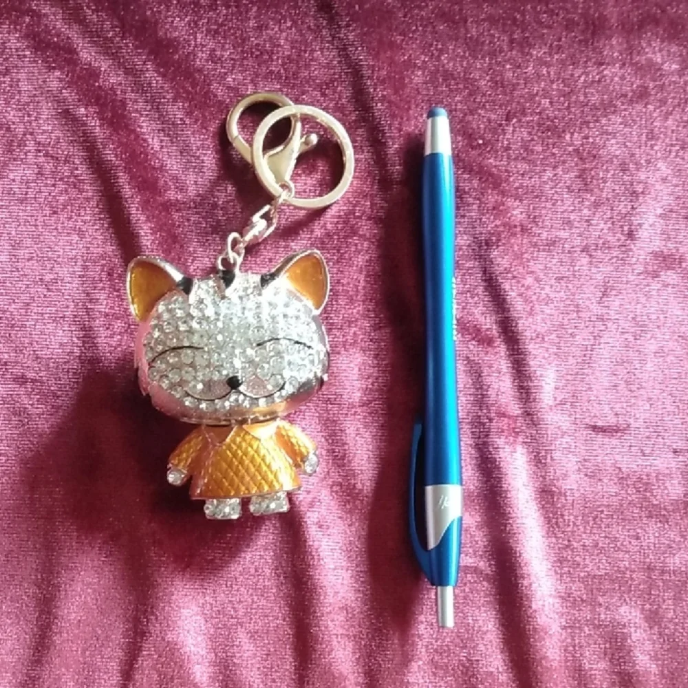 Sparkling Cat Keychain with Gold and Silver Accents